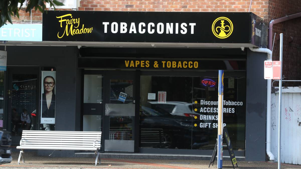 Stores like this in Fairy Meadow have not yet removed their vape signage, but the products are now banned from being sold outside pharmacies. Picture by Robert Peet