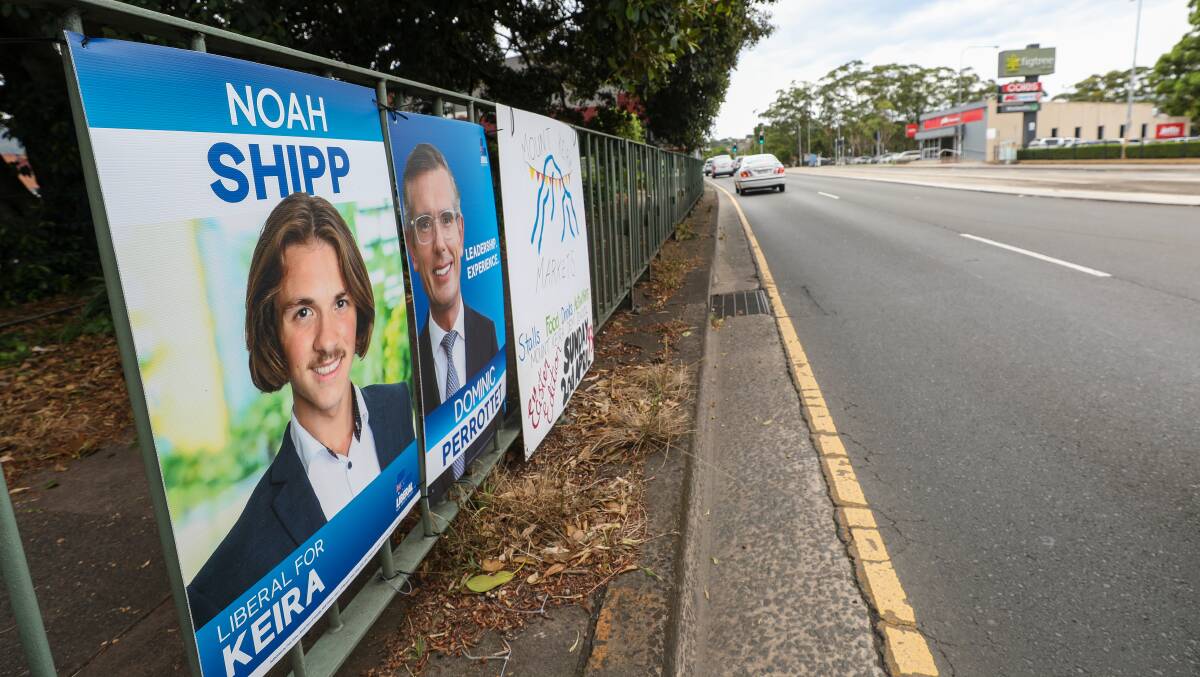 Liberal Party's teenage candidate Noah Shipp has got his face lined up next to Mr Perrottet - whose sign proclaims "leadership experience" - in at least a couple of locations.