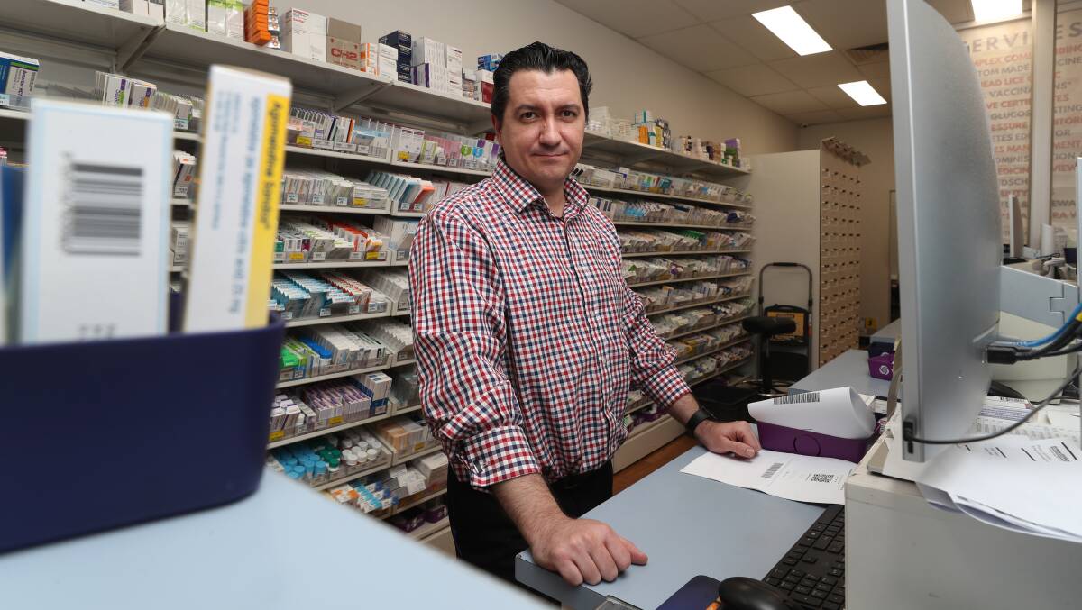 Warrawong pharmacist Peppe Raso raised concerns about the federal government's announcement that it will bring in 60-day scripts for some medications. Picture by Robert Peet.