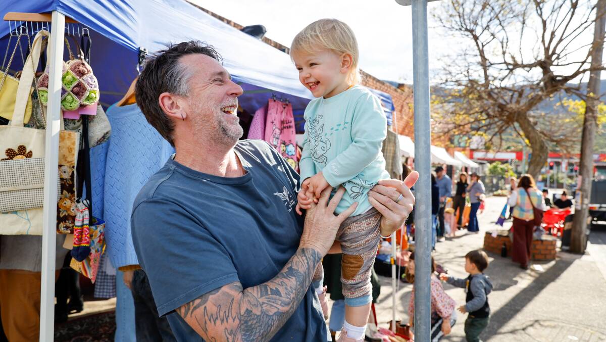 Matt Gillett and two-year-old Bambi at Frank's Wild Years Winter Market in Thirroul. Picture by Anna Warr