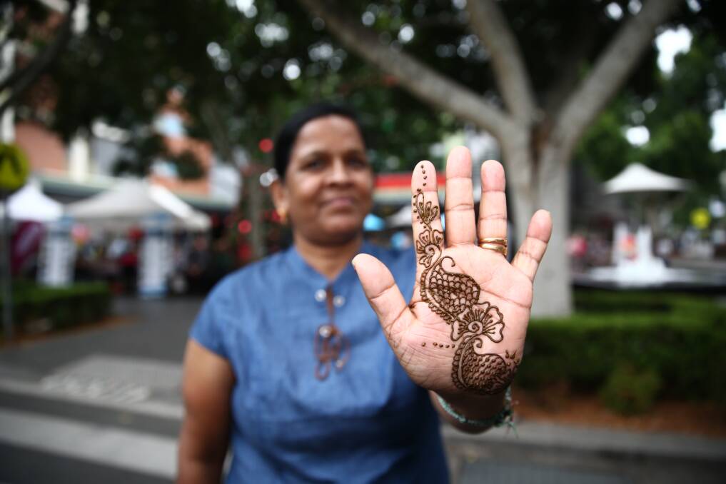 Kiama is to celebrate all things Indian with a new cultural festival this November. Above, a woman poses with a Henna tattoo in an ACM file image. Picture by Geoff Jones