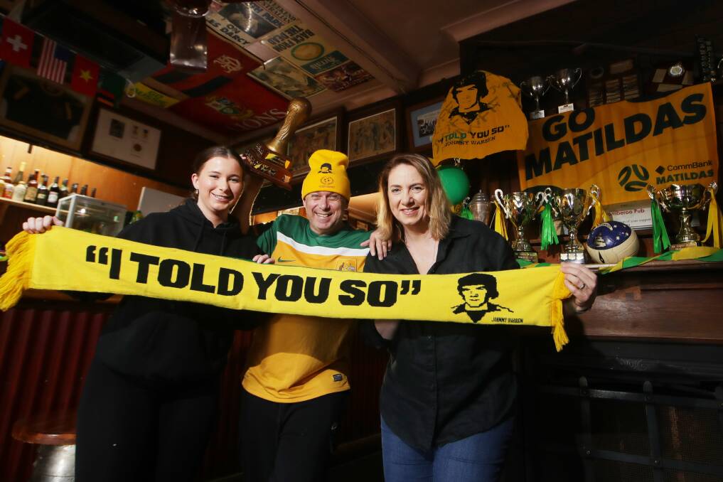 The Warren family (Gemma, Jamie and Cheryl) have stocked up on green and gold decorations and plenty of food to welcome a mass of Matildas fans to their Jamberoo Pub on Wednesday night. Picture by Sylvia Liber