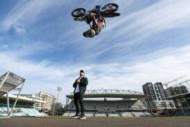FMX Star Harry Bink (top) stole the show as Alex Volkanovski was unveiled as event ambassador for the Wollongong round of the Australian Supercross Championship in at WIN Stadium in November. Picture by Adam McLean