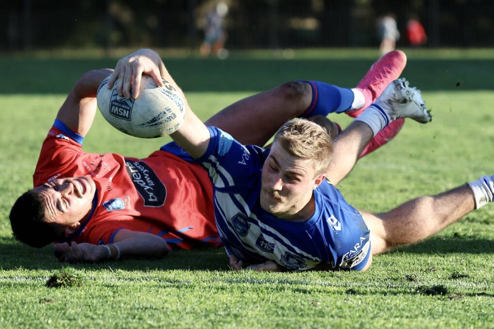 Tarje Whitford scores the second of his two tries for Thirroul on Saturday. Picture by Adam McLean