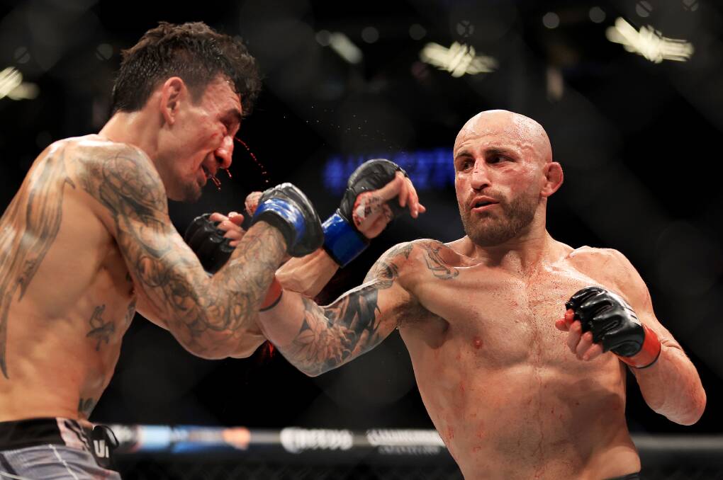 Alex Volkanovski puts the hurt on Max Holloway in their third bout. Picture Getty Images