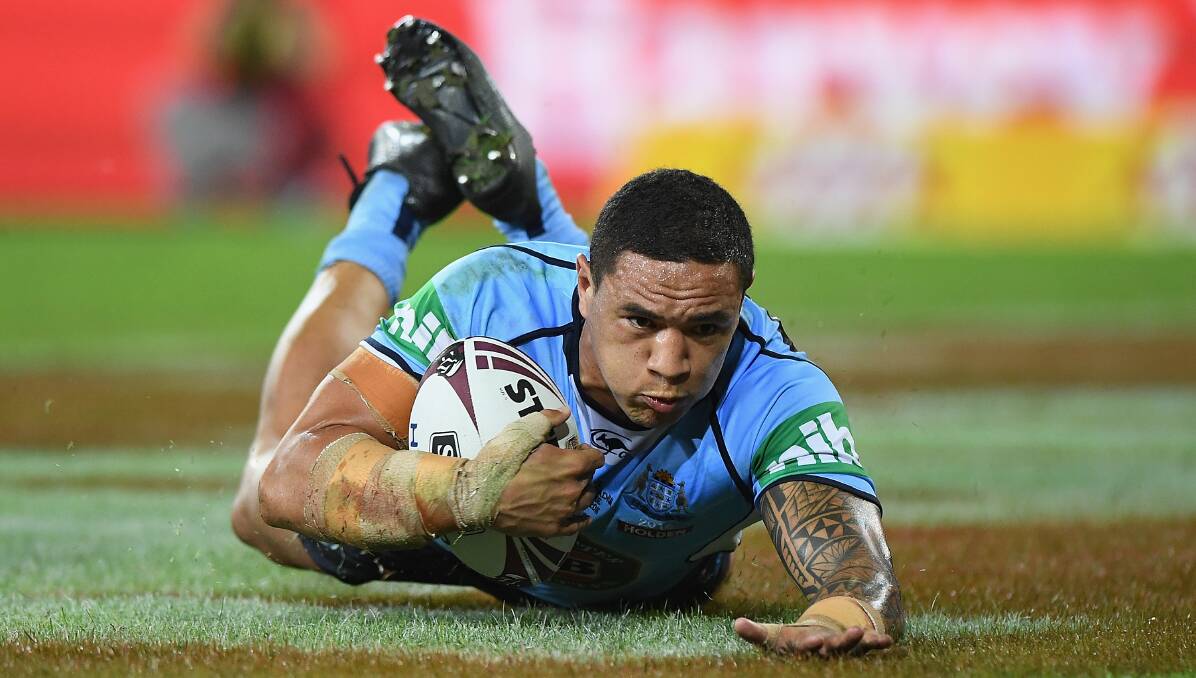 Blues and Roos: NSW forward Tyson Frizell scores during this year's State of Origin series. Picture: Getty Images