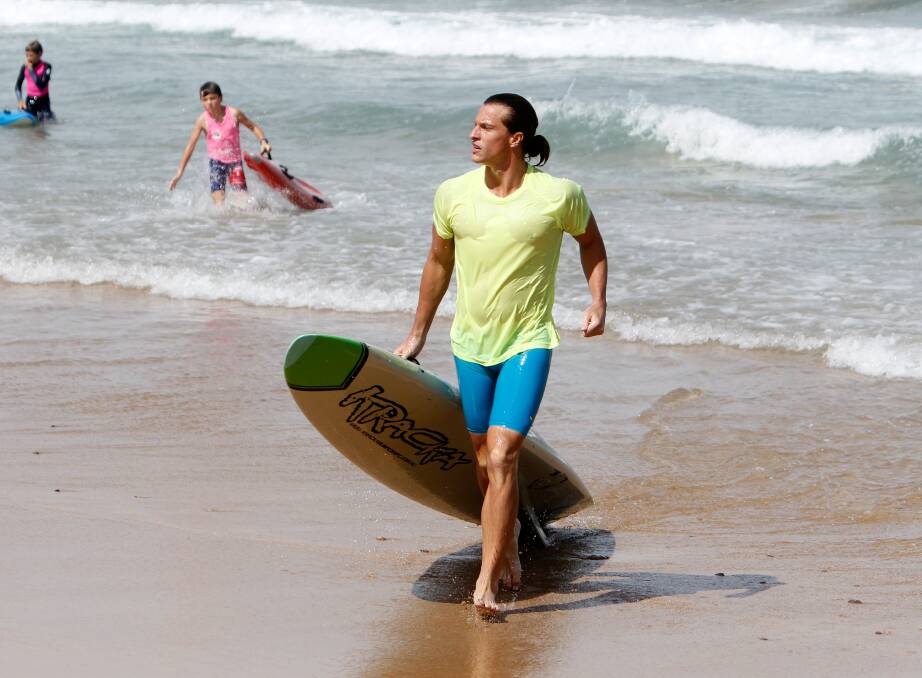 BOARD BATTLE: Ironman Max Beattie has returned to North Wollongong beach for the Summer of Surf series. The finals will be held on Saturday. Picture: Sylvia Liber