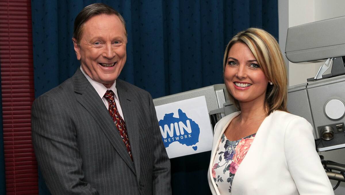 Geoff Phillips with Kerryn Johnston at WIN TV in 2013. Picture by Greg Totman