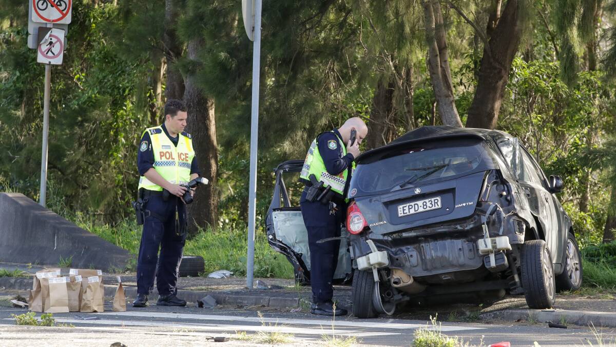 Police investigating the crash in Towradgi. Picture by Adam McLean