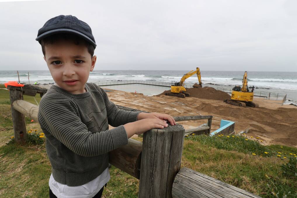 Diggers remove sand from Towradgi pool in epic effort. Pictures by Robert Peet and supplied