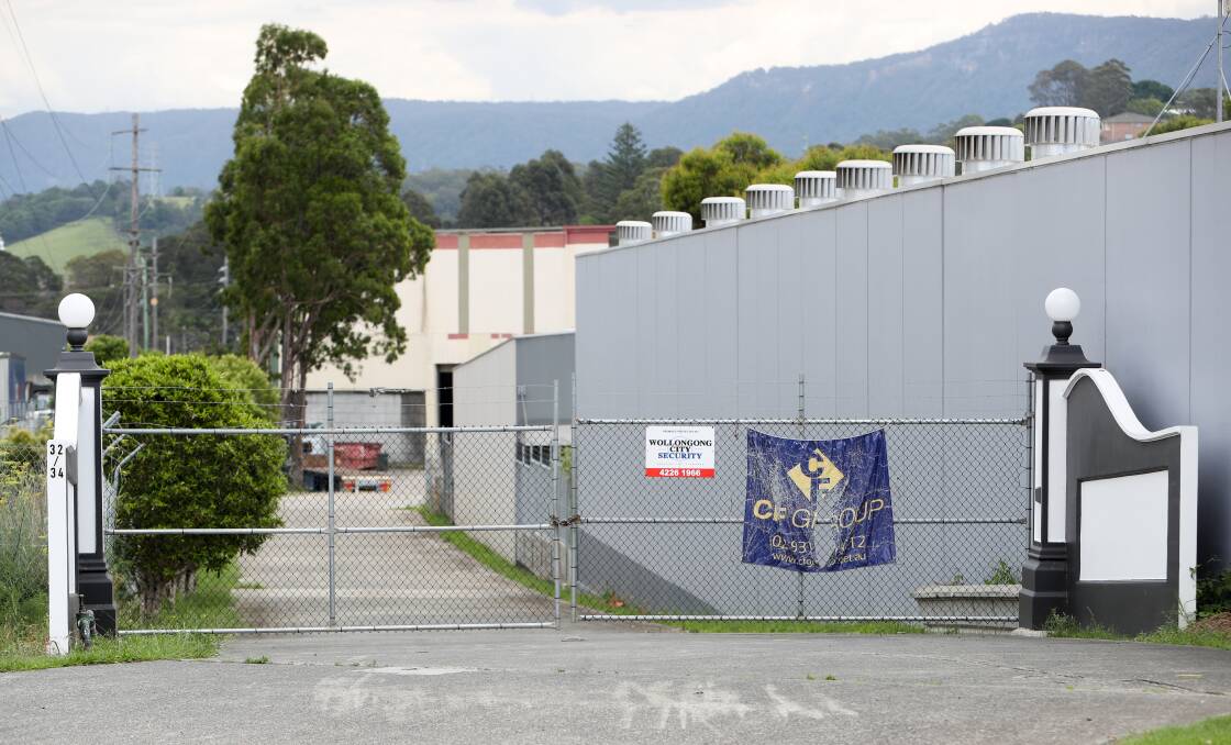 CLEAN UP NOTICE: The CF Group site on Doyle Ave in Unanderra where the EPA said 10 tonnes of asbestos contaminated material has been stored. Picture: ADAM McLEAN.