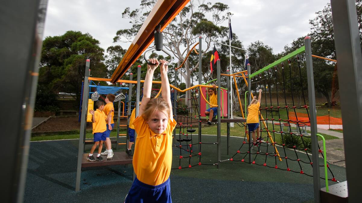 SHARE THE SPACE: Lake Heights Public School students playing on the school's playground. 17 Illawarra schools will be open to the public during the holidays. 