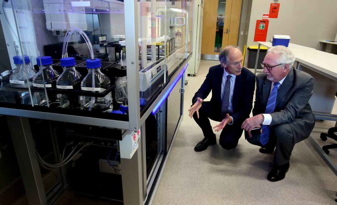 Australia's chief scientist Dr Alan Finkel, here with Professor David Adams, visited the university to open IHMRI's electrophysiology laboratory in 2018.