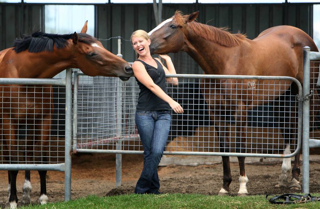 Jennifer Robinson at her dad's stables in Berry in 2008. Picture by Sylvia Liber