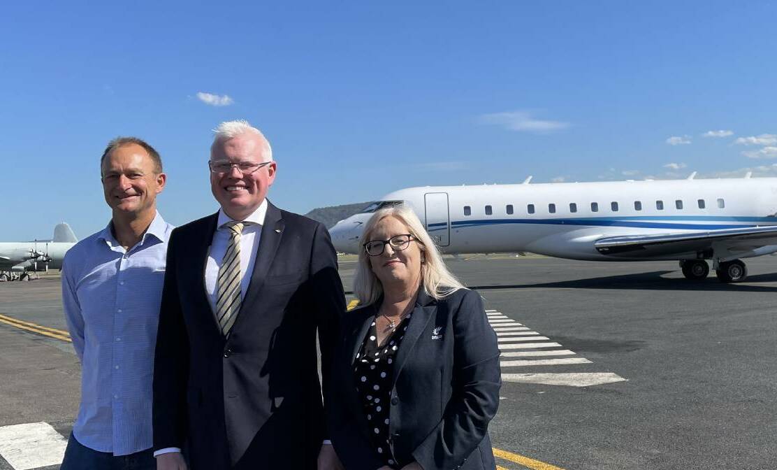 Chris Homer, Gareth Ward and Kellie Marsh at the Shellharbour airport announcement on Monday. Picture by Connor Pearce.