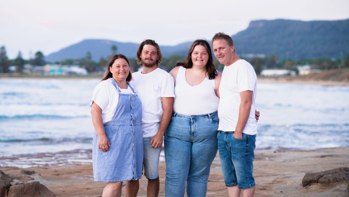 Connor Pringle, second from left, stands with his mother Racheal, sister Libby and father Mark beside the ocean. Picture supplied