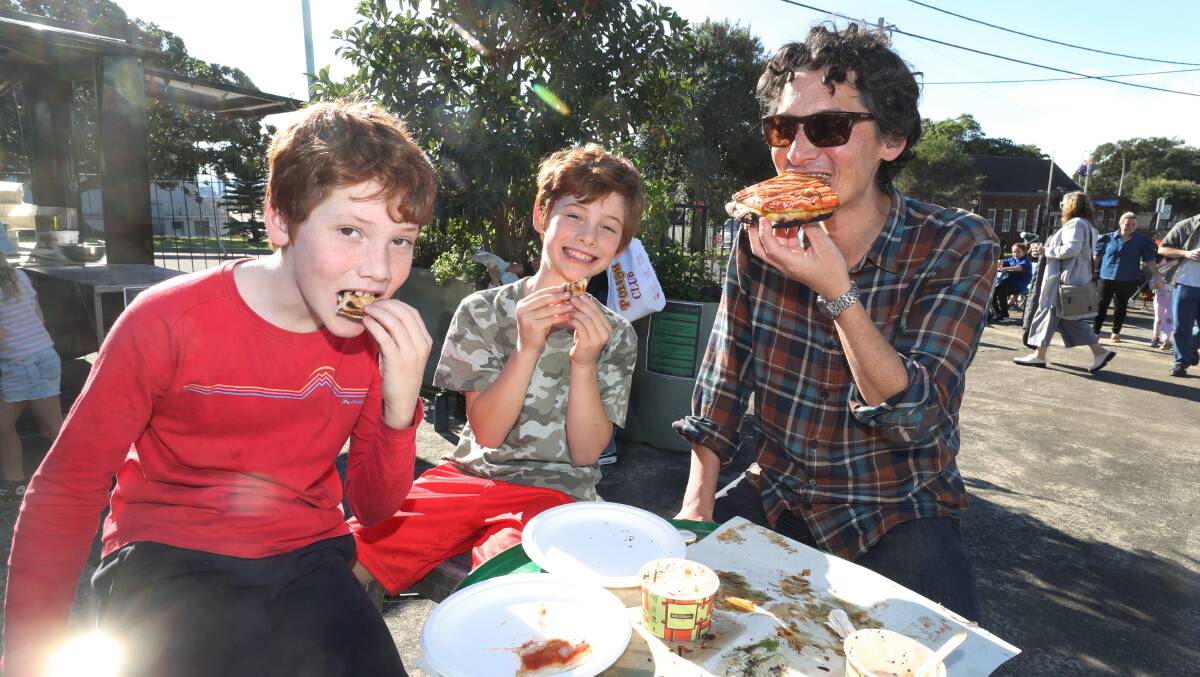 Oscar, Charlie and James Tan at Pizza Gate in at the Servo in Port Kembla. Picture by Robert Peet