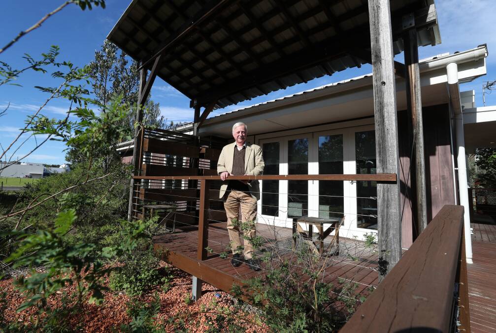 Professor Tim McCarthy, director of UOW's Sustainable Buildings Research Centre, outside the net zero energy Illawarra Flame House. Picture by Robert Peet