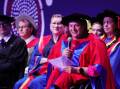 Para-athlete and honorary Doctor of Letters Louise Sauvage addresses UOW graduates. Picture by Sylvia Liber