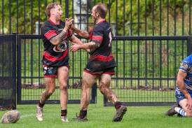 Jay Watling celebrates with Collegians team-mate Alec Reid after scoring his second try in his team's 20-12 win over Thirroul at Collegians Sports Complex on Saturday. June 15, 2024. Picture by Adam McLean
