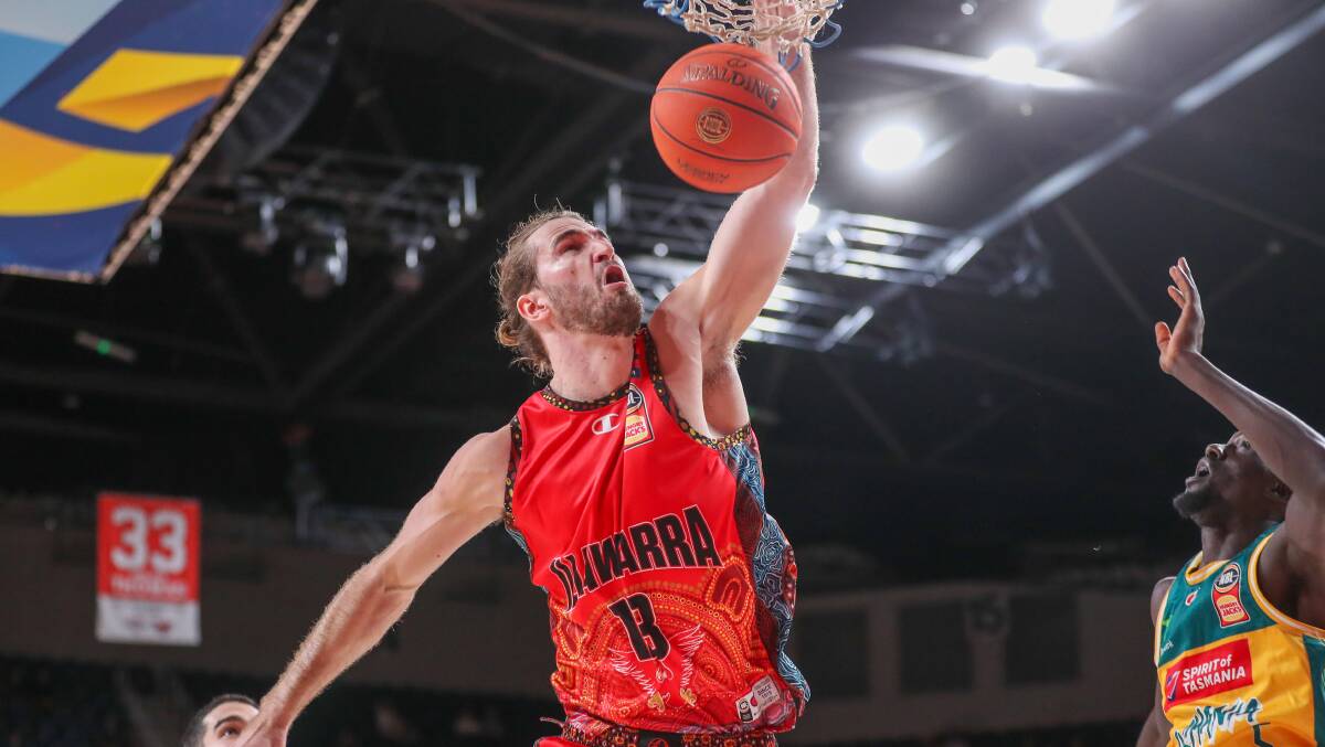 Illawarra Hawks centre Sam Froling dunks during his team's 100-89 loss to Tasmania JackJumpers at WIN Entertainment Centre on Saturday, December 23, 2023. Picture by Adam McLean