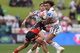 St George Illawarra forward Jaydn Sua tackled during the Dragons 26-6 win over the Dolphins at Netstrata Jubilee Stadium on Sunday,June 30, 2024. Picture by Jason McCawley/Getty Images