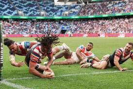 Roosters winger Dominic Young scores a try during his team's round 18 win over St George Illawarra Dragons at Allianz Stadium on Sunday, July 7. Picture by Cameron Spencer/Getty Images