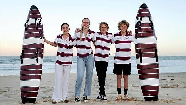 Wollongong City Surf Life Saving Club members Kiah and Isabella Evans alongside Milton and Darcy Stepanovski. Picture by Sylvia Liber