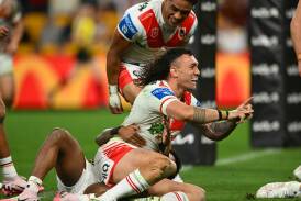 St George Illawarra forward Jaydn Su'A celebrates scoring a try during the Dragons round 19 NRL match against the Brisbane Broncos at Suncorp Stadium on Saturday, July 13, 2024. Picture by Albert Perez/Getty Images