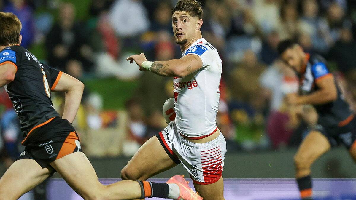 Zac Lomax on the way to scoring one of his three tries he scored for St George Illawarra in the Dragons 56-14 win over Wests Tigers at WIN Stadium on Friday, June 7, 2024. Picture by Adam McLean