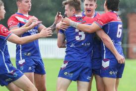 Gerringong Lions players celebrate scoring a try in their Interclub Challenge victory over Thirroul Butchers Picture by Adam McLean
