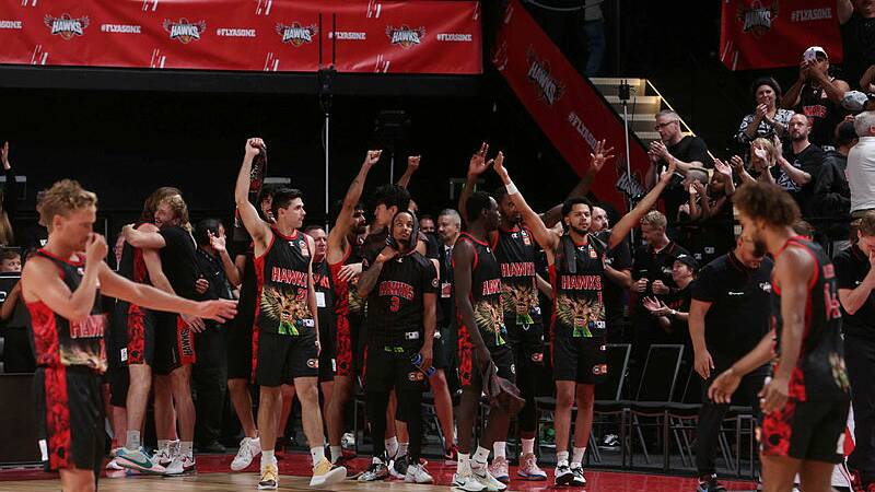 The Illawarra Hawks will be hoping to continue celebrating during their NBL finals' campaign. Picture by Sylvia Liber.