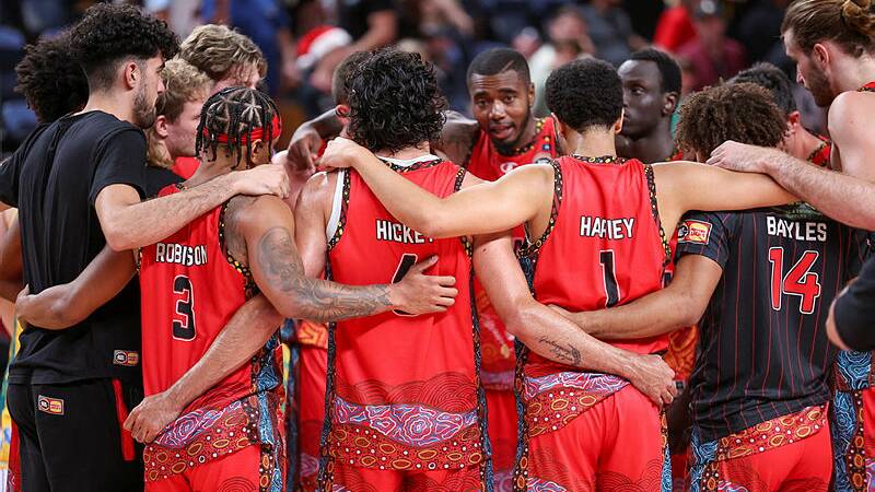 The Illawarra Hawks gather in a huddle after their loss to Tasmania JackJumpers at WIN Entertainment Centre on Saturday, December 23, 2023. Picture by Adam McLean