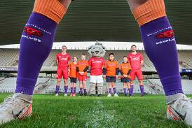 Lachlan Scott, Maddy Marston, Jackson Marston, Malakai Penman, Zachary Marston and Darcy Madden launch the KidsWish Charity Match between the Wollongong Wolves and Sydney Olympic. Adam McLean