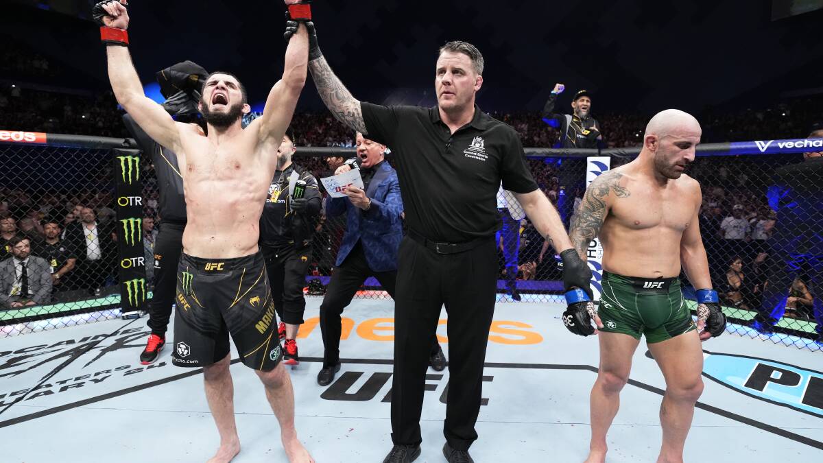 Islam Makhachev raises his arms after beating Alex Volkanovski in Perth. Picture: Getty Images