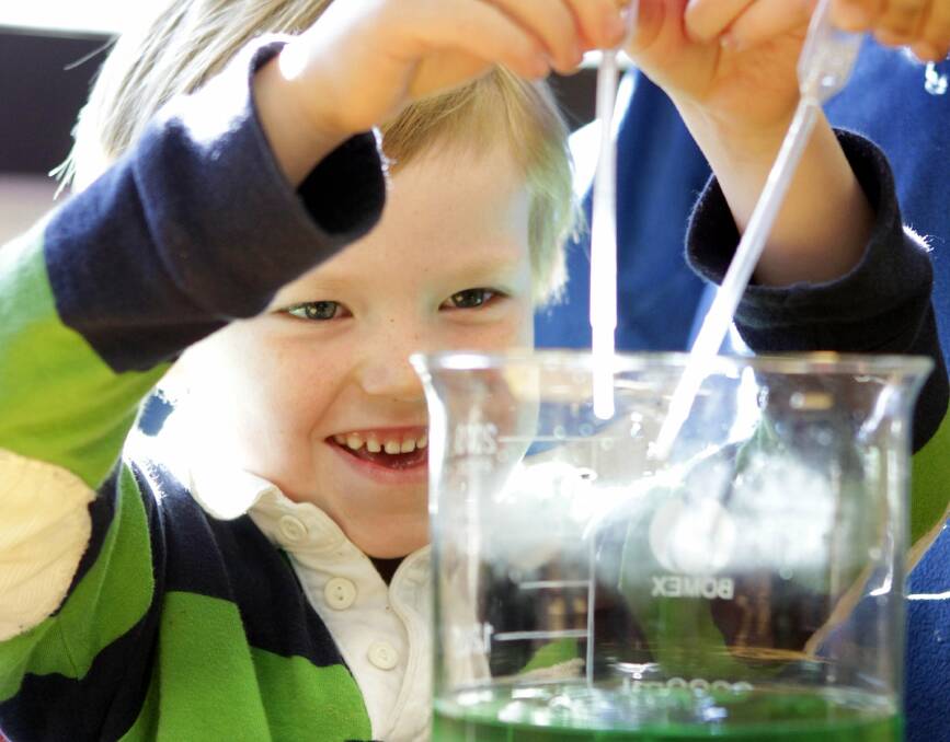SCIENCE WEEK: Henry Chadban, 5 of Mosman enjoying a science lesson at the Wollongong Science Centre in 2015. Picture: Andy Zakeli