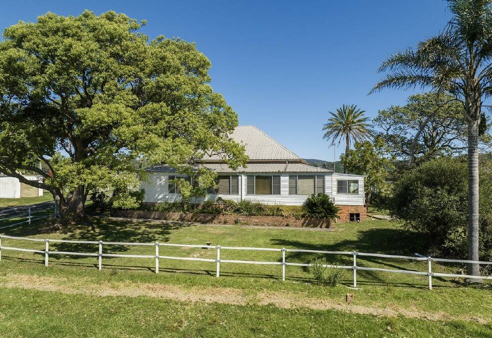 The house on the property is double brick (circa 1900) and has three double bedrooms and potentially two single bedrooms, and also features high ceilings, multiple fireplaces, and wraparound verandahs. Picture: Supplied