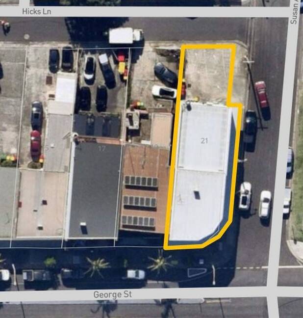 The property is a 348 square metre site with a two-storey building, rear parking with side street and rear lane access. 