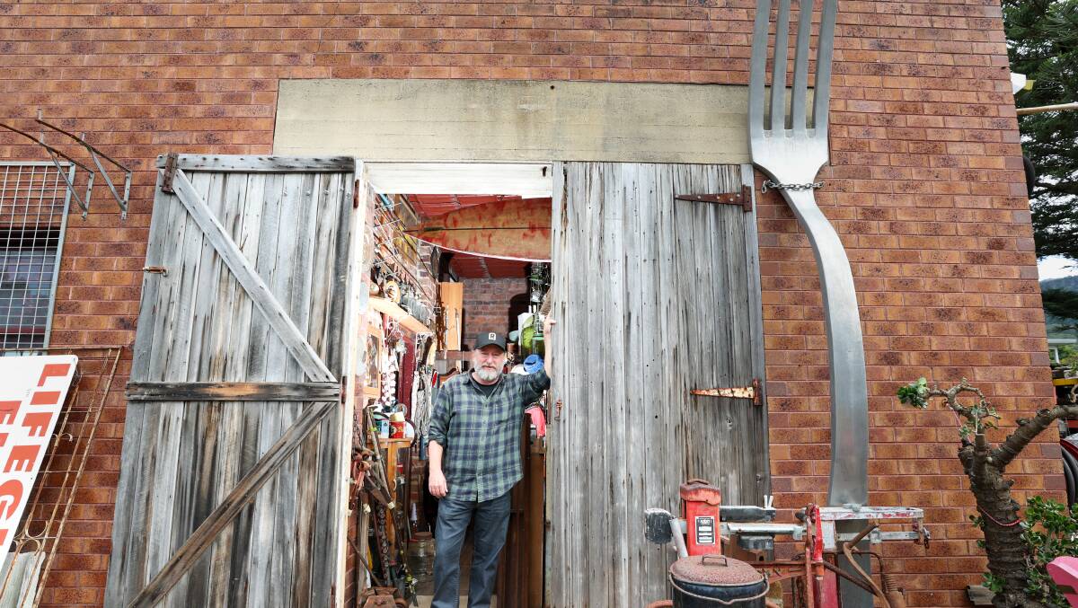 Wombat co-owner Russell Hall at the side door to his shop in Thirroul. Picture by Adam McLean