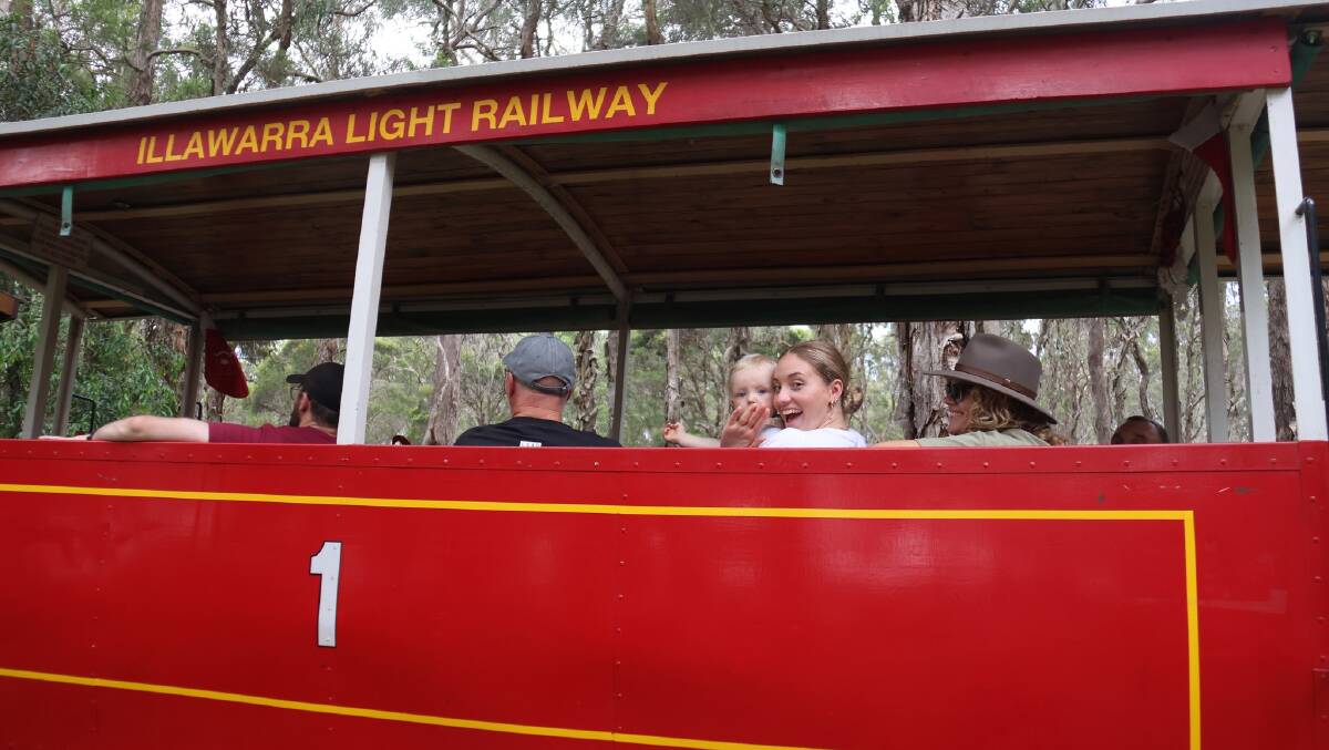 Passengers aboard a train carriage at Illawarra Light Railway Museum.