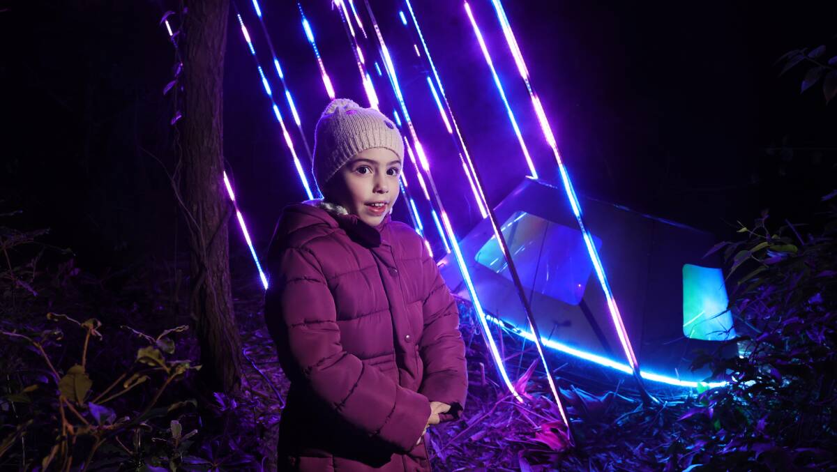 A rugged-up girl gets a sneak peek at Shellharbour's new Enchanted Forest adventure.