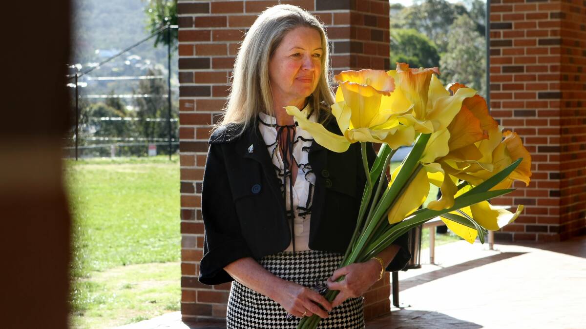 Deputy Principal of TIGS Monica Watt marking the Cancer Council's Daffodil Day in 2009. Ms Watt was a cancer survivor. 