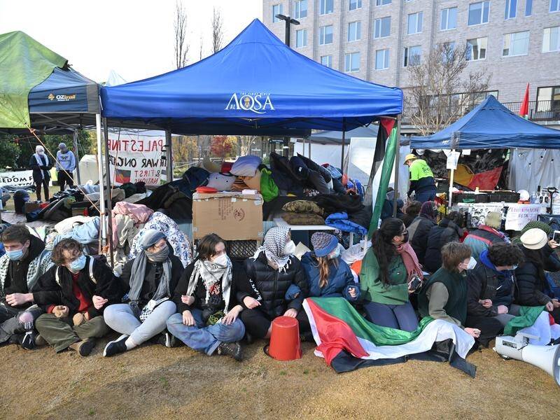Students barricade the Gaza solidarity encampment at the Australian National University in Canberra. (Mick Tsikas/AAP PHOTOS)