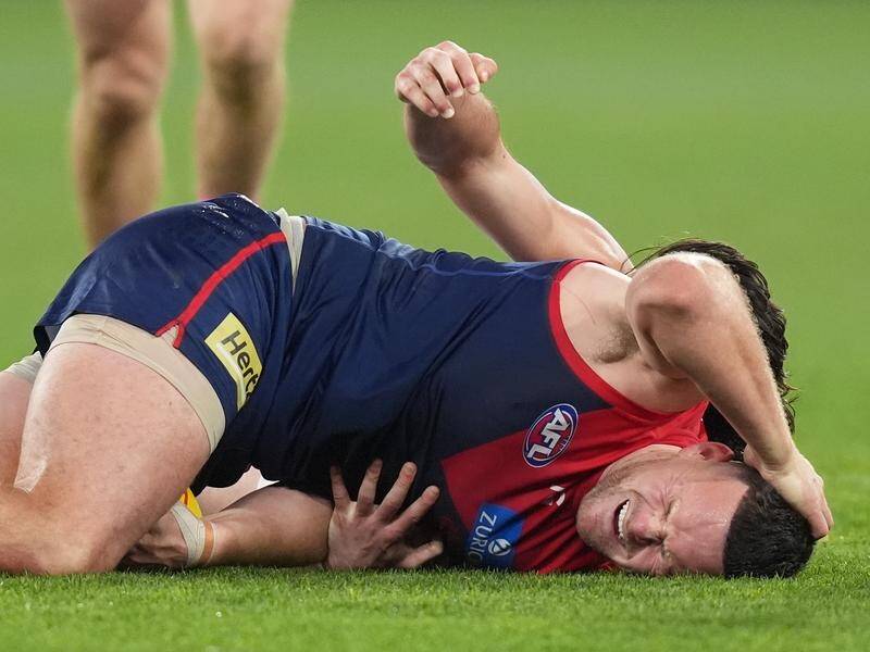 Melbourne's Steven May is under fire after appearing to feign a head injury against the Kangaroos. (Daniel Pockett/AAP PHOTOS)