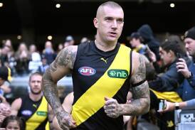 Dustin Martin will run out for his 300th game in Tigers colours against the Hawks at the MCG. (Joel Carrett/AAP PHOTOS)