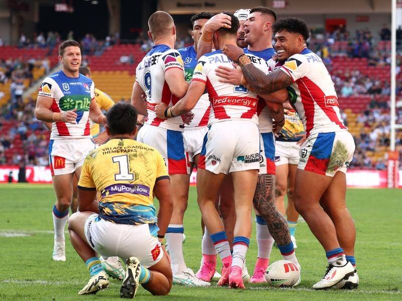 Newcastle have stormed home after halftime to defeat the Titans in Brisbane. (Jason O'BRIEN/AAP PHOTOS)