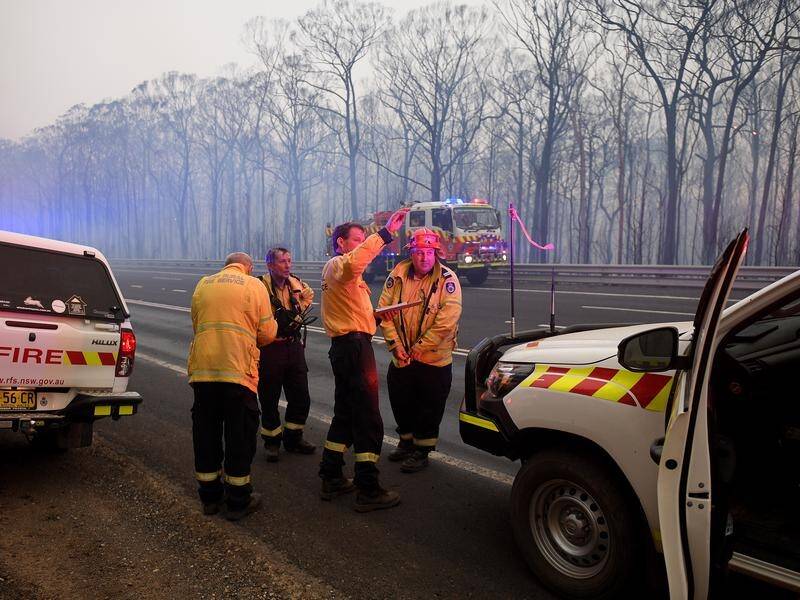 Firefighting crews will regroup in milder conditions as the Gospers Mountain blaze moves west.