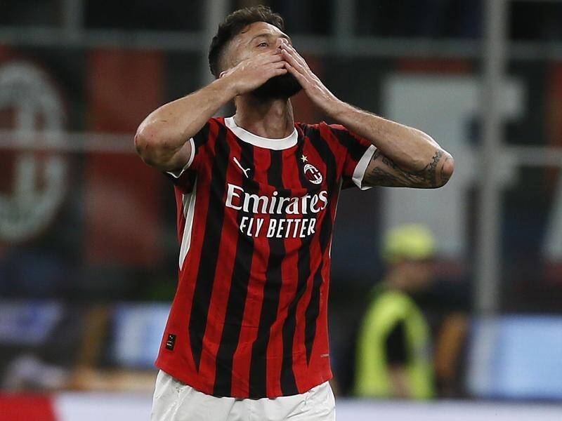 Olivier Giroud blows kisses to the fans after scoring in his last match for AC Milan. (AP PHOTO)