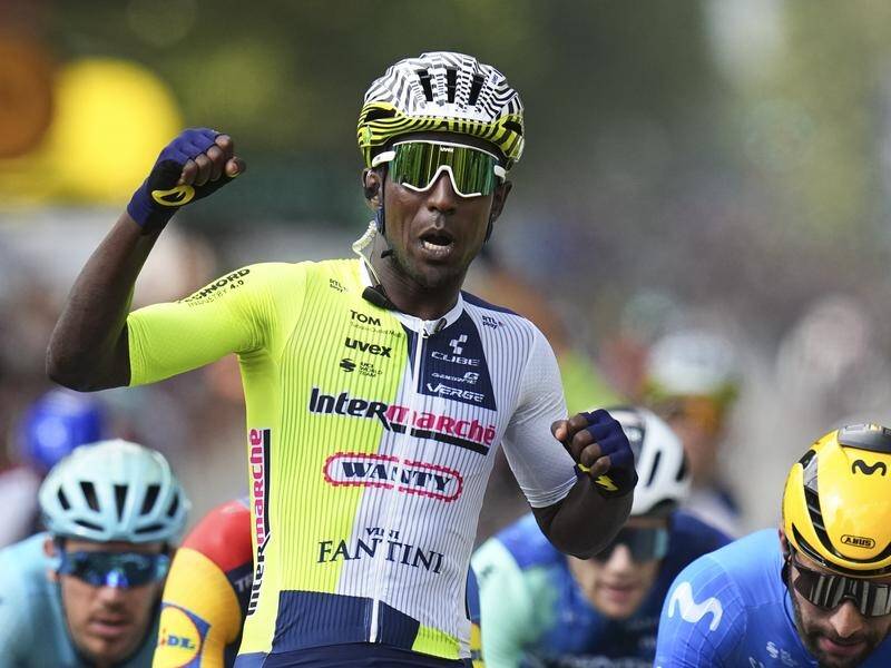 Eritrea's Biniam Girmay celebrates his historic victory in the third stage of the Tour de France. (AP PHOTO)