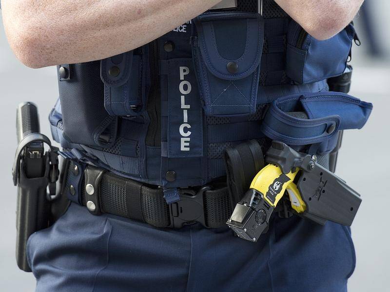 Police used a taser to subdue the armed man after he allegedly stabbed a senior constable. (Dave Hunt/AAP PHOTOS)